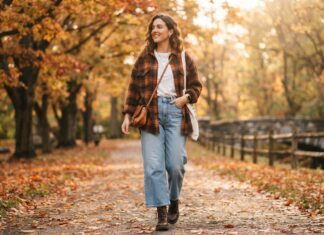 10 Chic Coffee Run & Weekend Casual Outfits Woman wearing a plaid flannel shirt and wide-leg denim